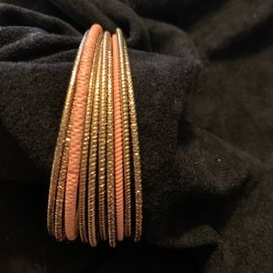 10 gold tone & coral bangle bracelets